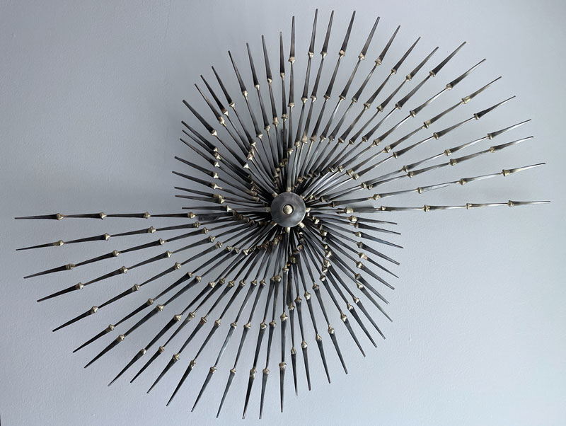 Title: “Pinwheel Sunburst 2X”
Medium: Antique style nails
brazed onto a central axle
Size: 31 x 22 x 4 inches