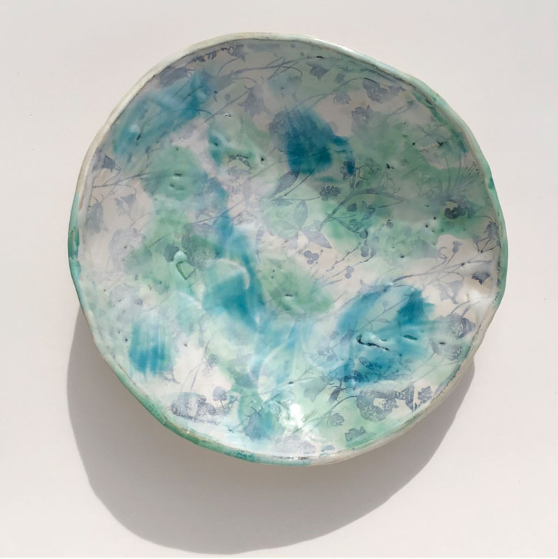 Title: “Lovely Blues, serving bowl”
Medium: Stoneware, turquoise,
celadon, and snow glaze with
underglaze image transfer
Size: 14 inches in diameter