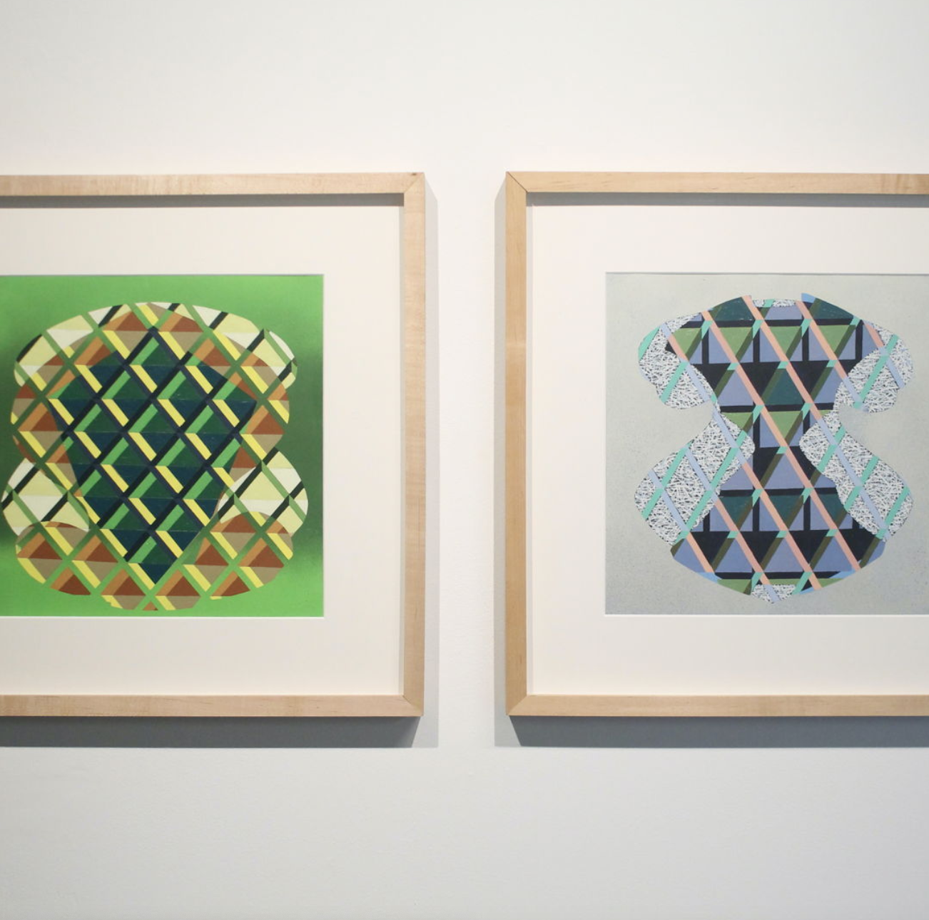 two framed pictures on a wall