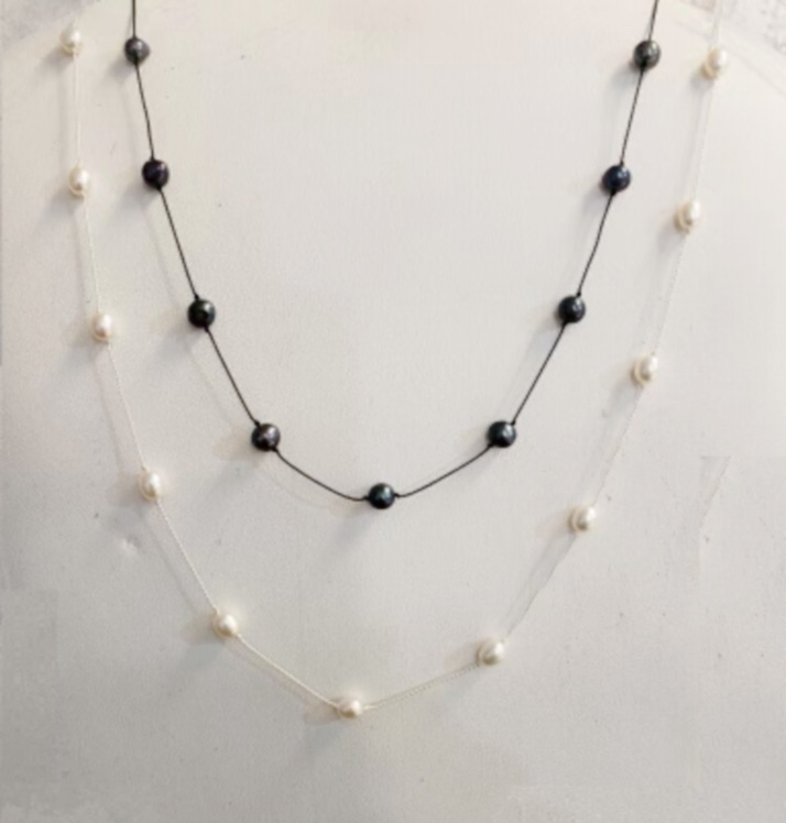 a necklace with pearls on it