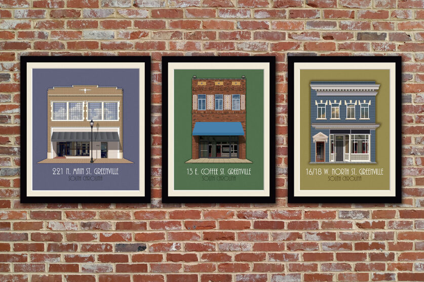 a group of framed pictures on a brick wall
