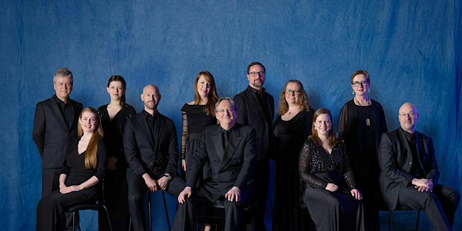 a group of people in black