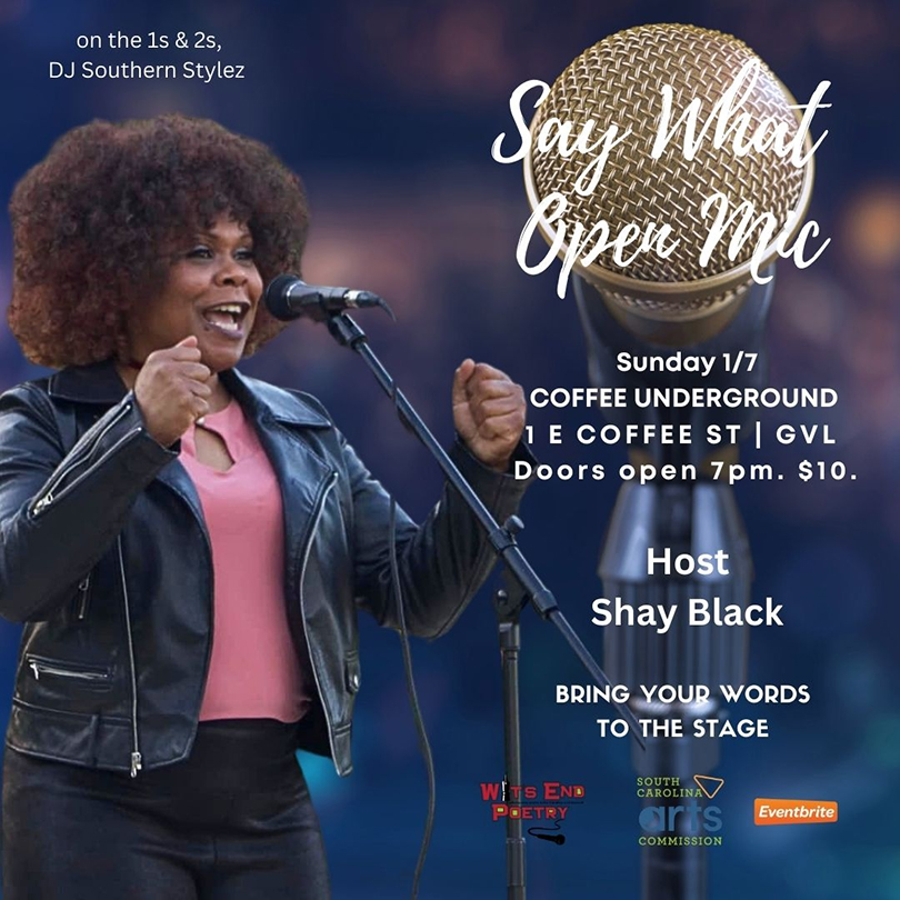 a woman singing into a microphone