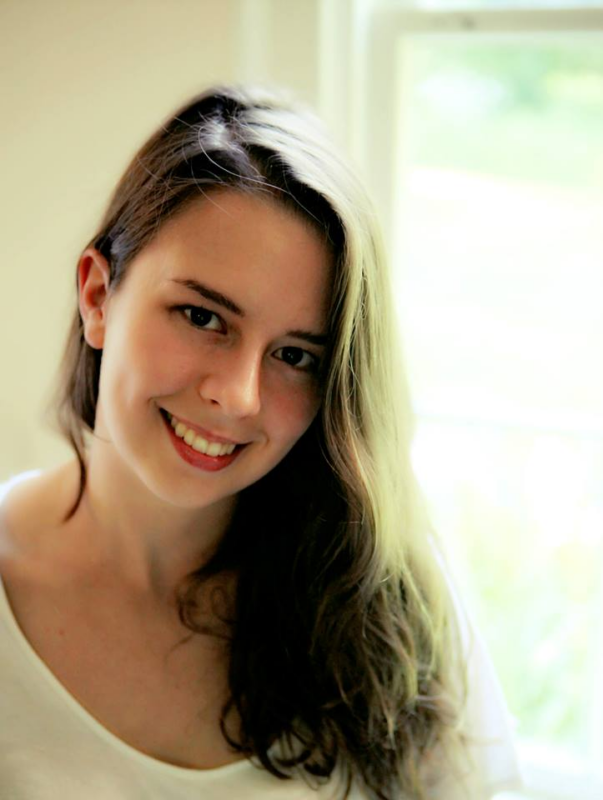 a woman smiling at camera