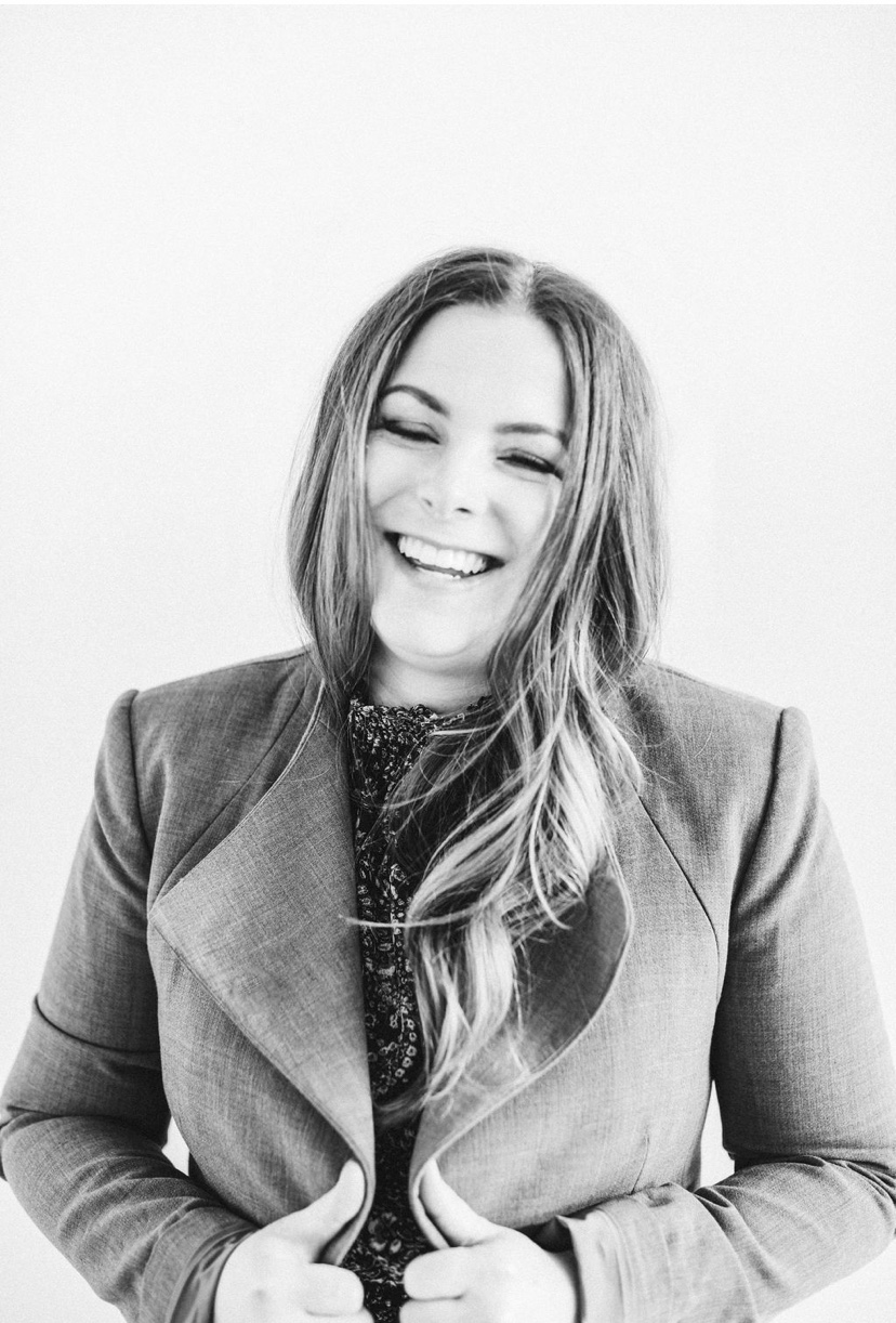 a woman smiling with long hair
