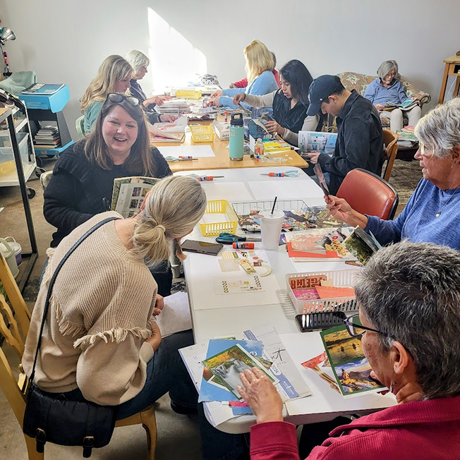 a group of people sitting around a table