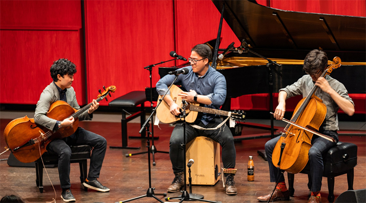 a group of people playing instruments