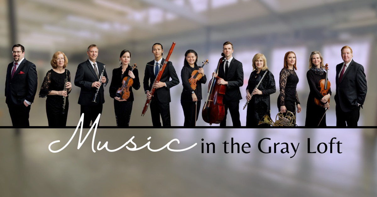 a group of people holding instruments