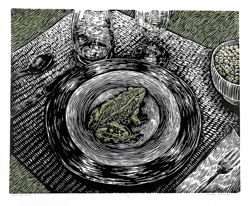 a frog on a plate