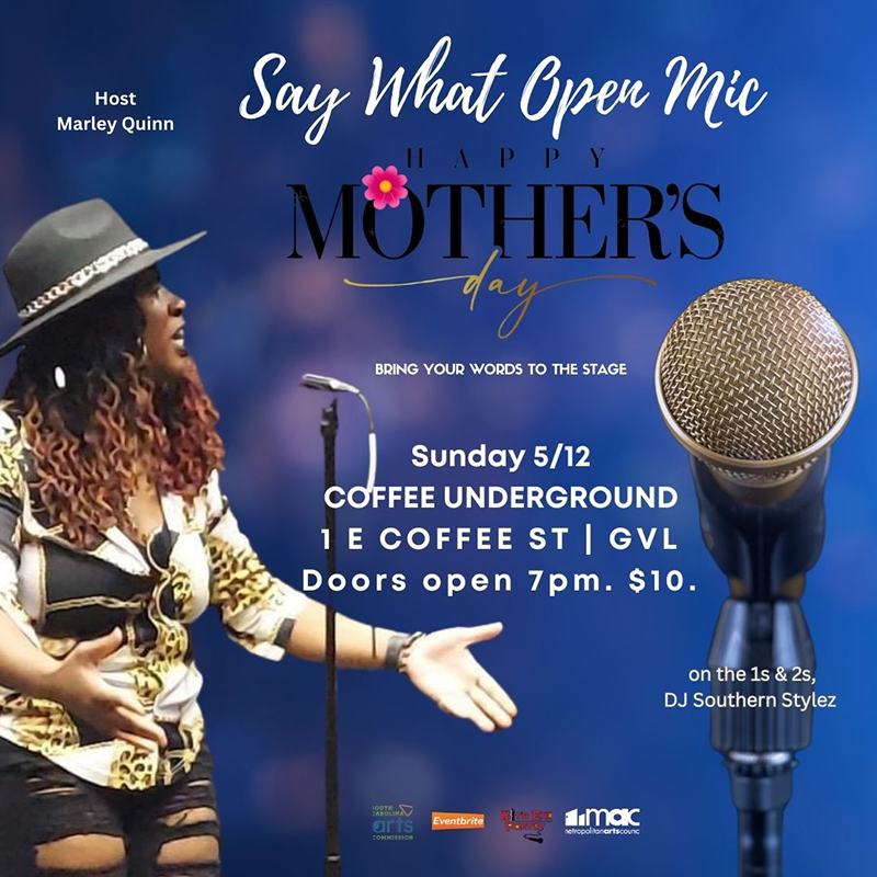 a woman singing into a microphone