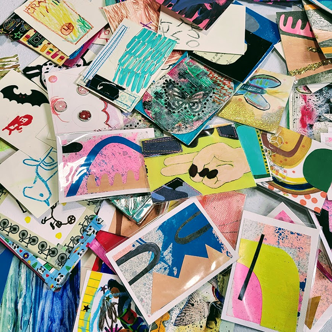 a pile of art cards