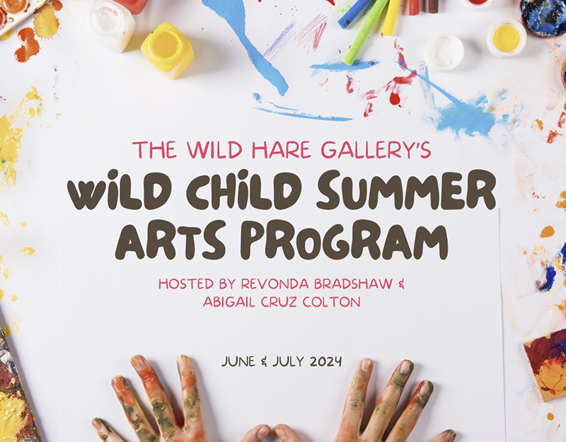 a poster with hands and paint on it