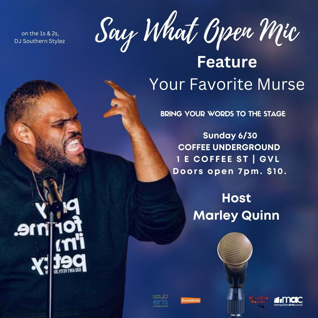 a man singing into a microphone