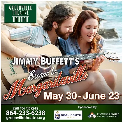 a man and woman playing guitar on a beach
