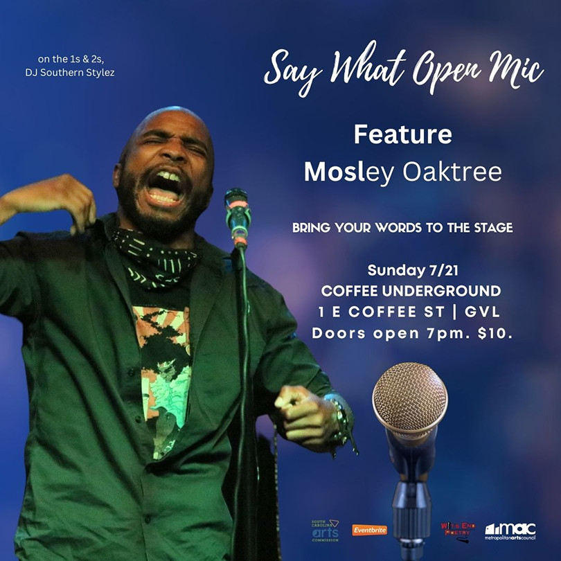 a man singing into a microphone