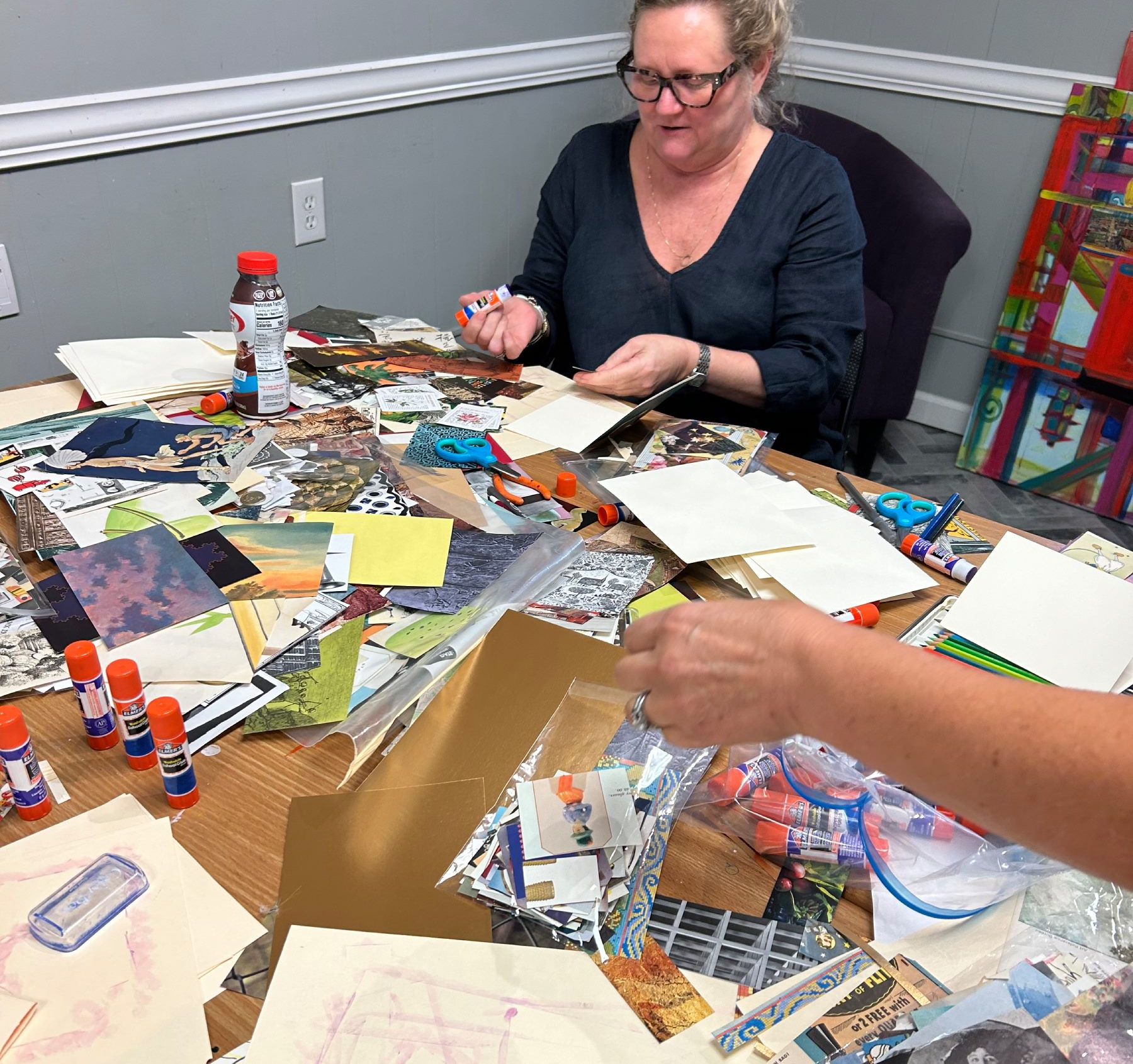 artist working on collage
