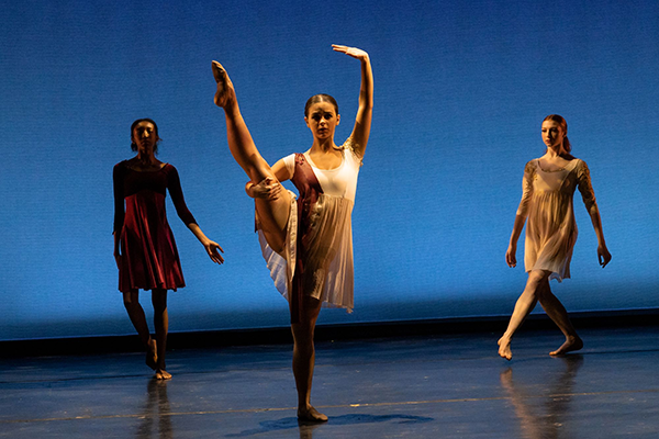 a group of women dancing on a stage