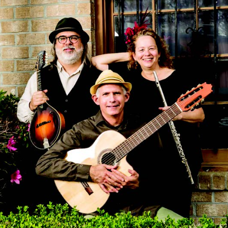 a group of people holding instruments