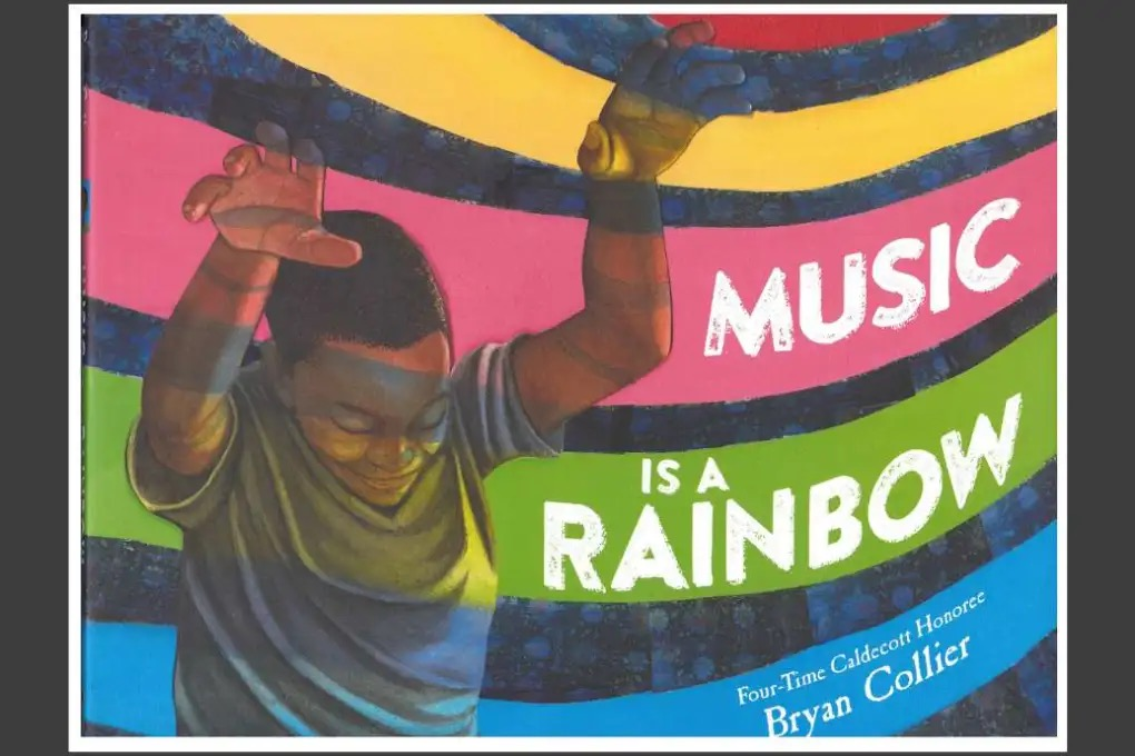 a poster of a boy with his arms raised