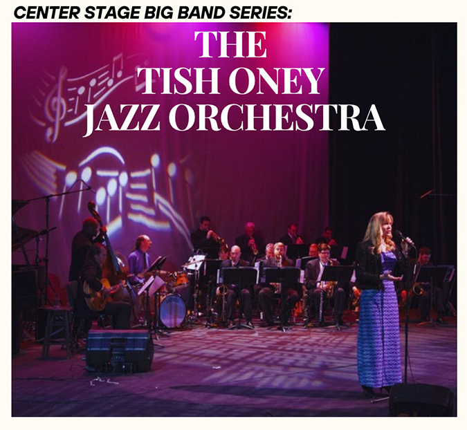 a woman on a stage with a band