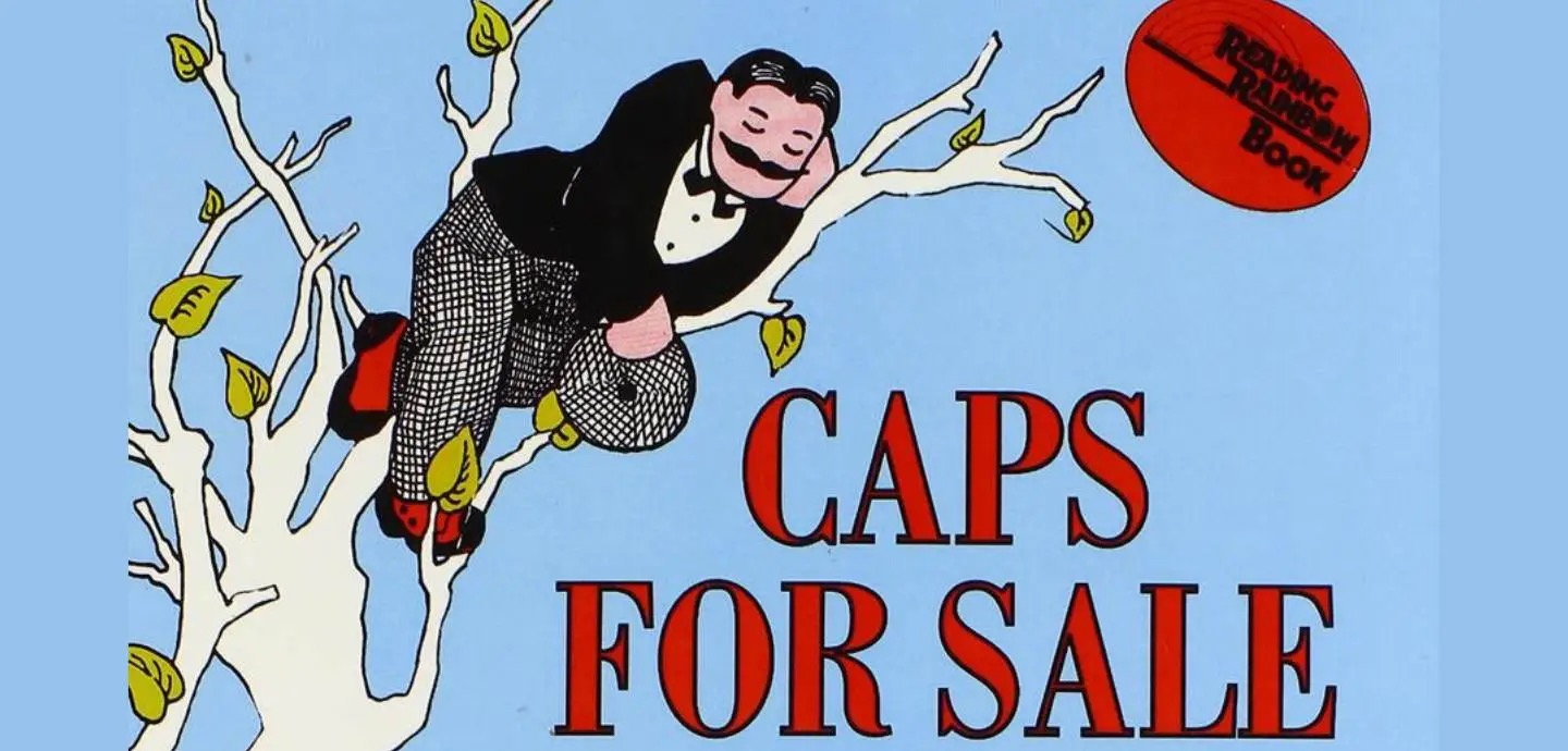 a man in a suit and tie on a branch