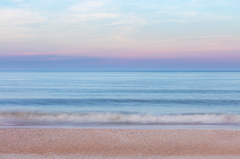 long exposure of the beach and ocean in the early evening