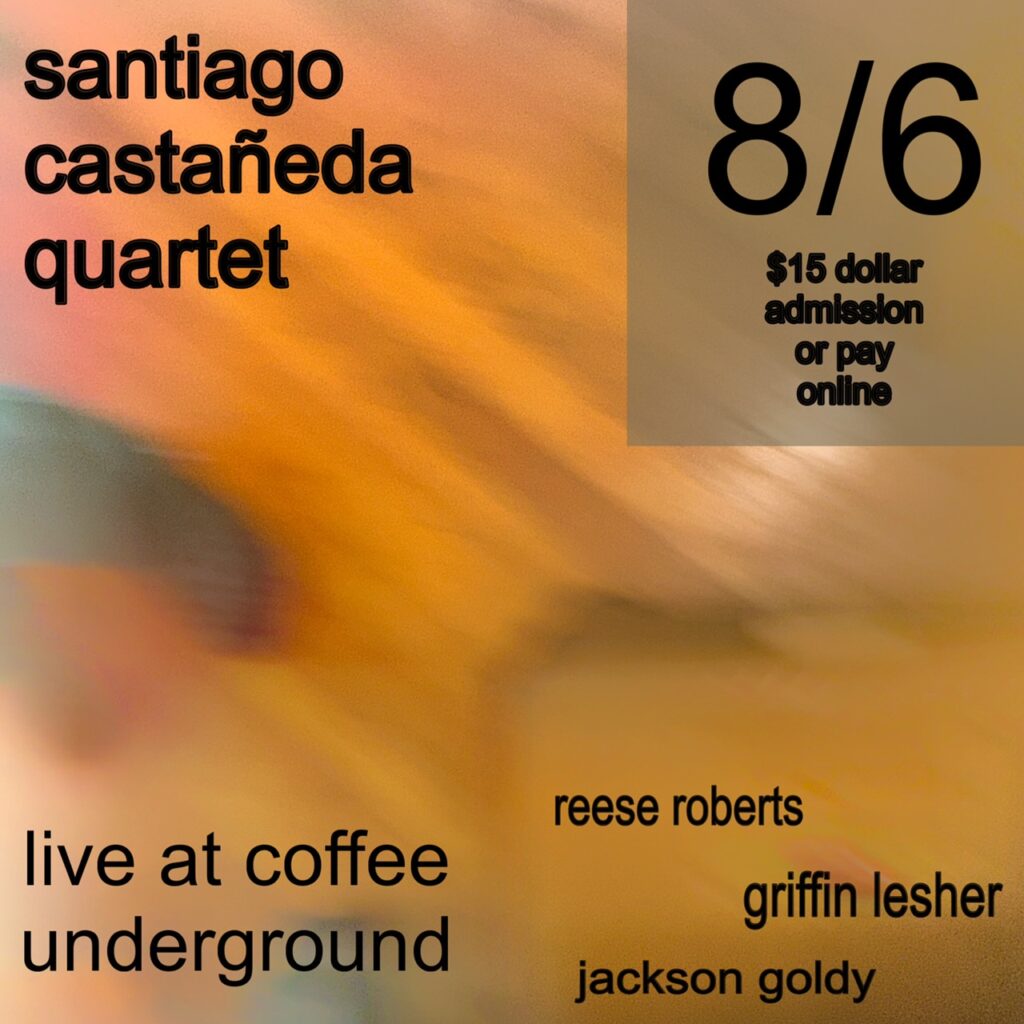 a blurry image of a concert ticket