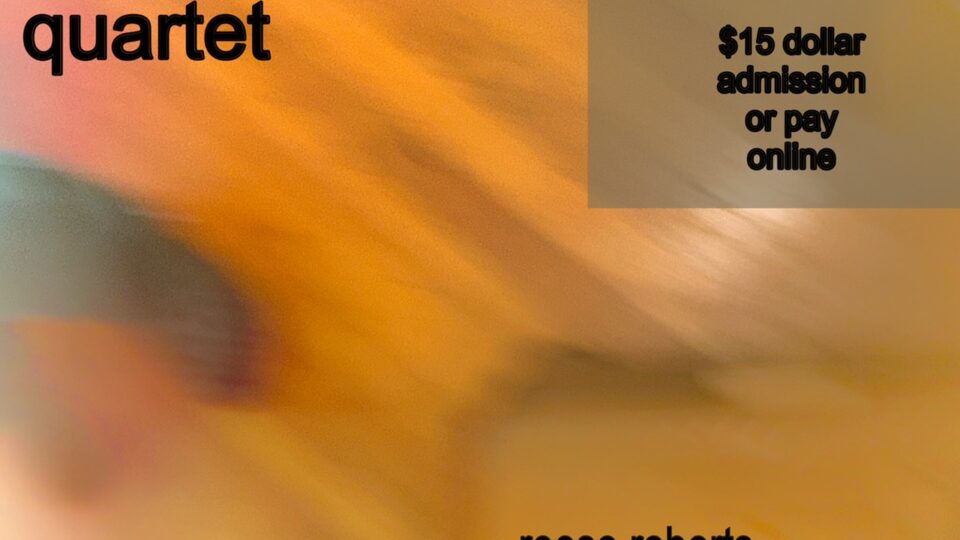 a blurry image of a concert ticket