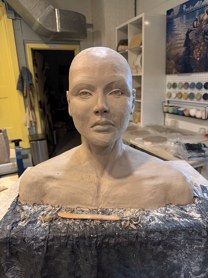a sculpture of a woman's head