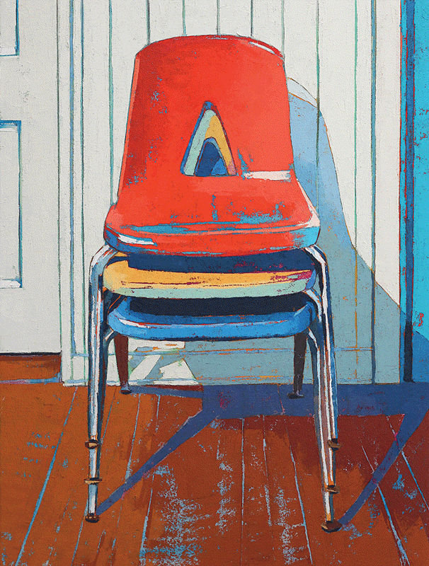 a stack of chairs in a room