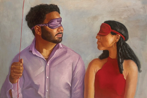 a man and woman holding a string