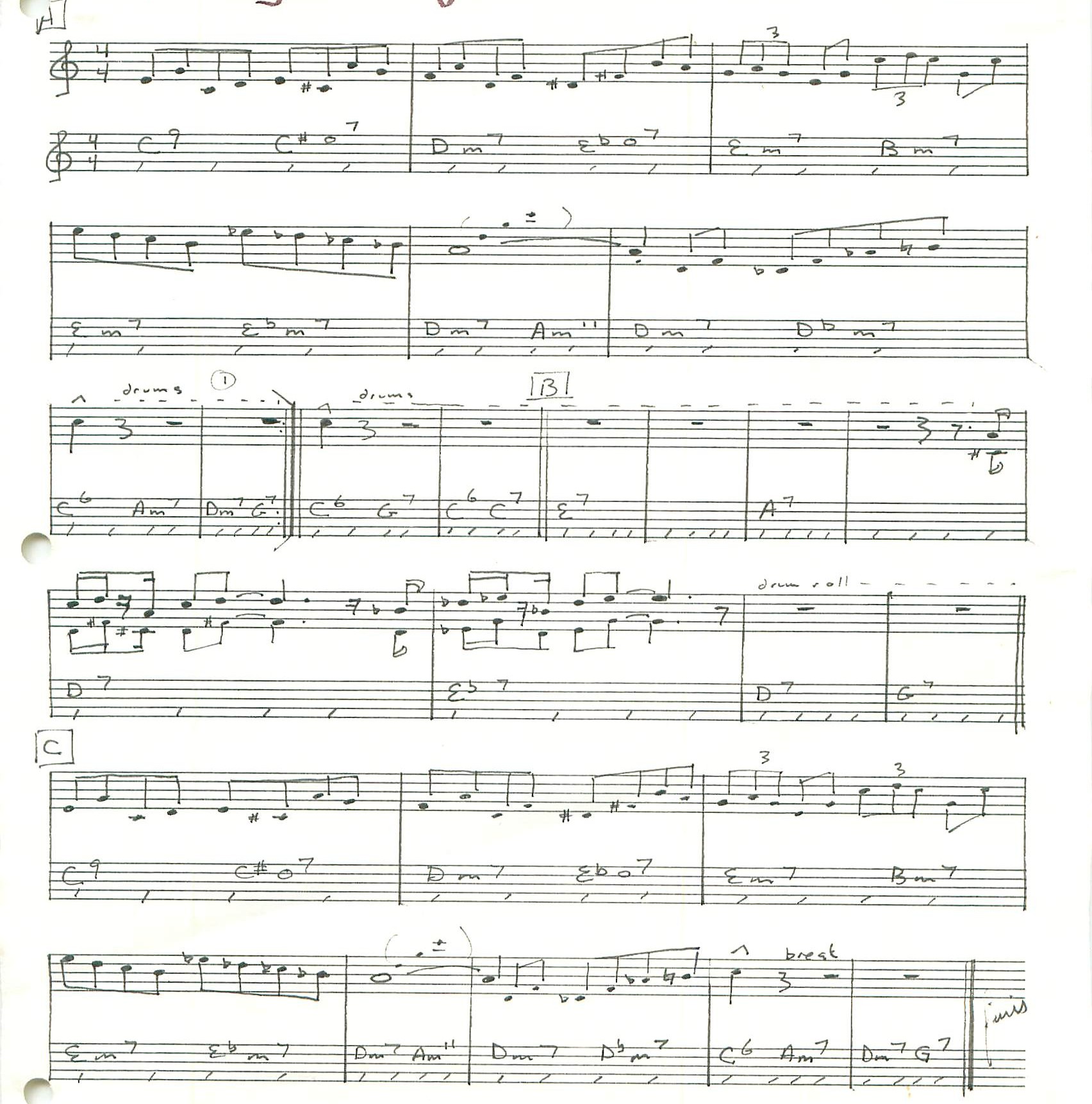 a sheet of music with handwritten notes