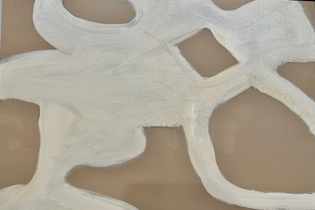 a white paint on a brown surface
