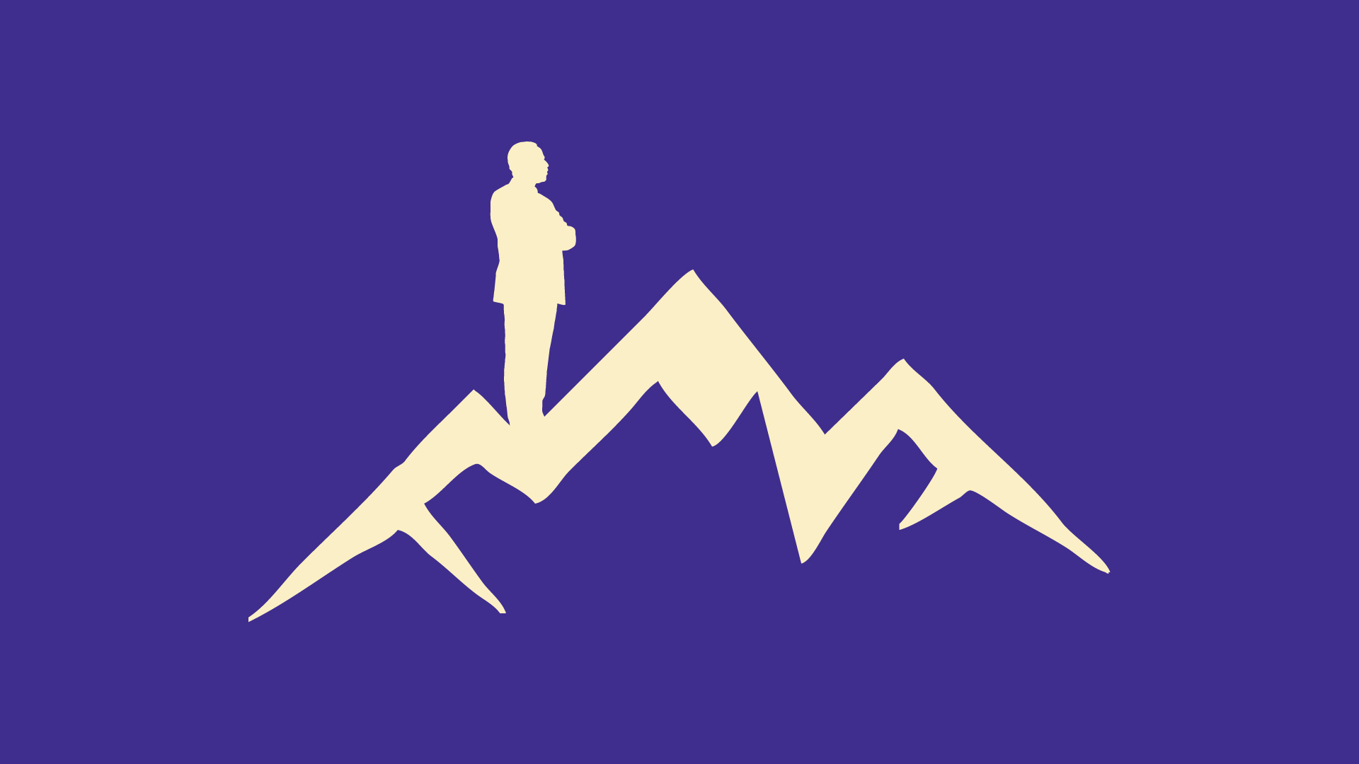 a man standing on a mountain