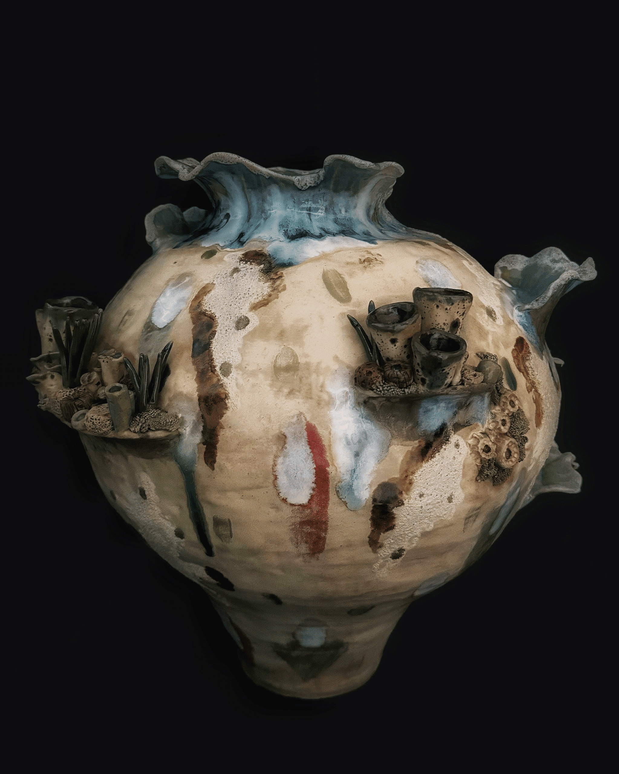 a large ceramic vase with a black background
