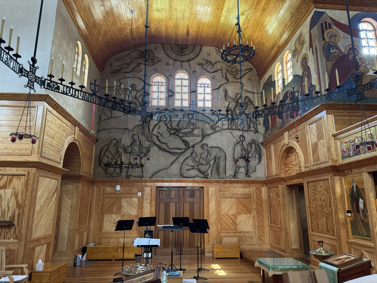 a room with a mural on the wall