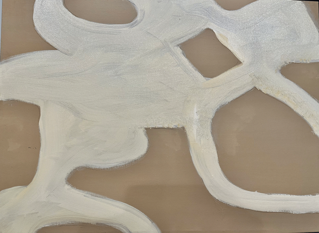a white paint on a brown surface