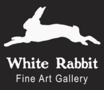 a white rabbit jumping in the air