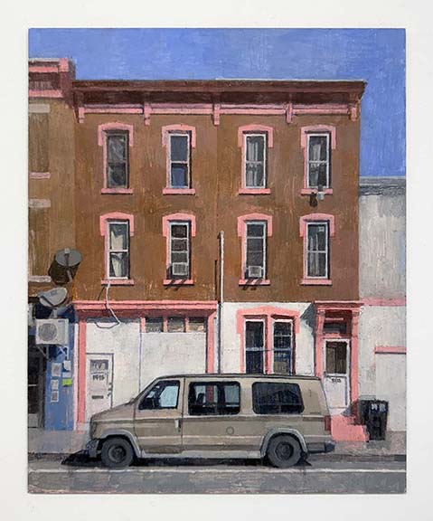 a van parked in front of a building