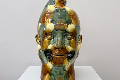 a sculpture of a man's head