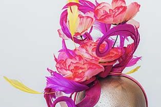 a hat with flowers on top