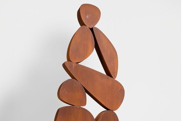 Abstract wooden sculpture of figures