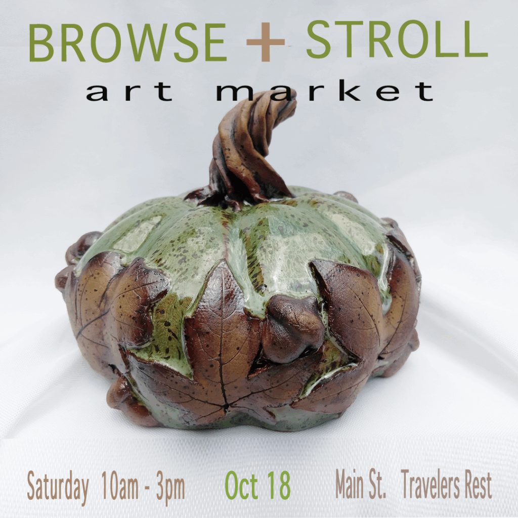 Art market featuring decorative pumpkin sculpture