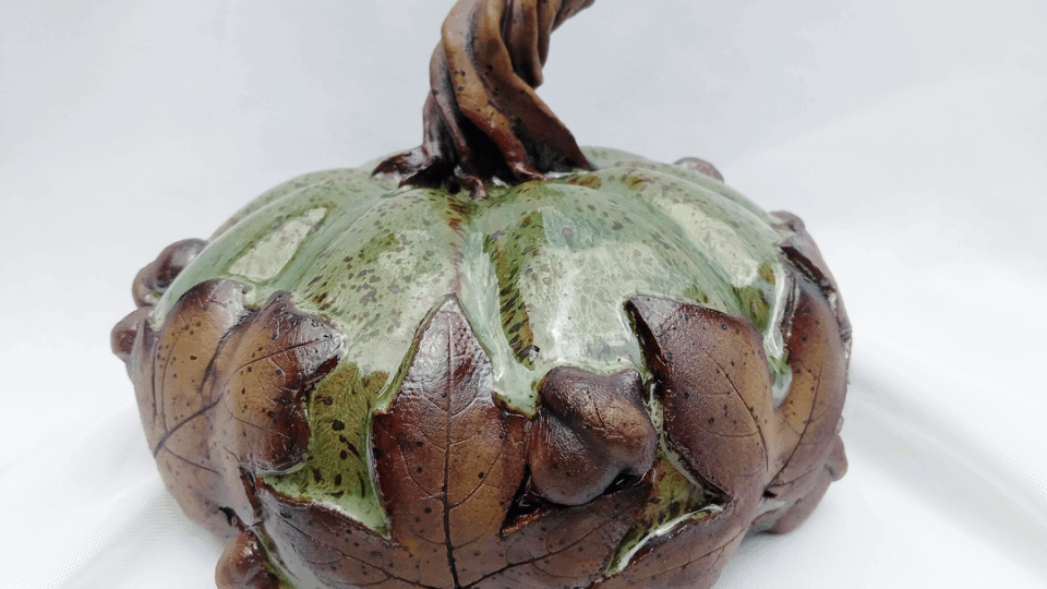 Art market featuring decorative pumpkin sculpture