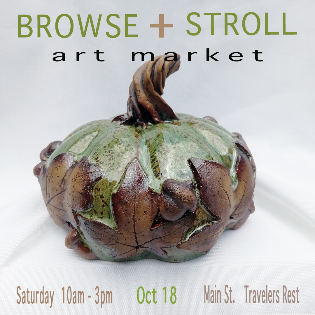 Art market featuring decorative pumpkin sculpture