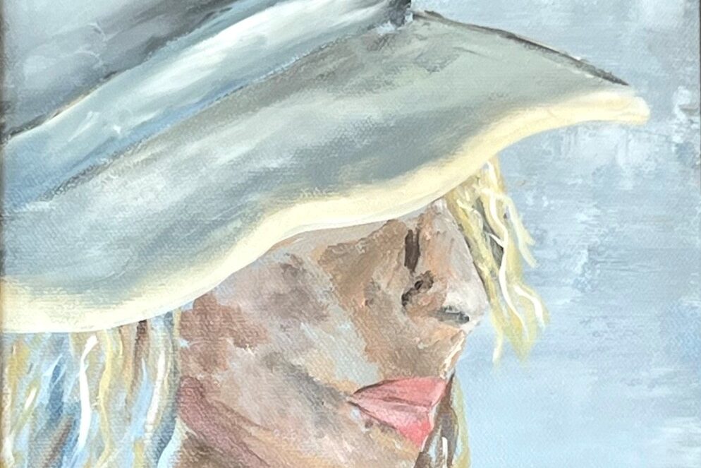 Woman wearing a wide-brimmed hat