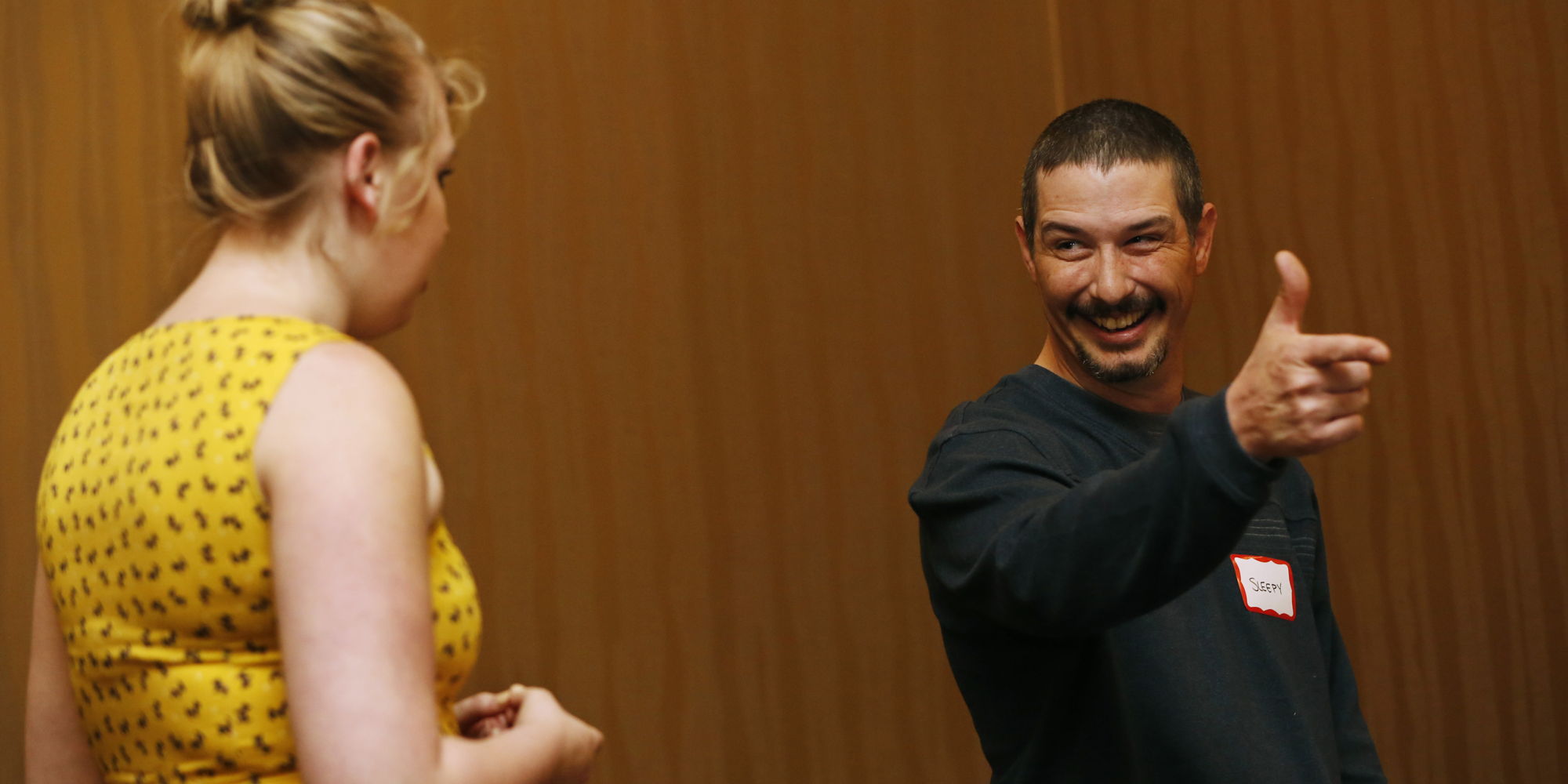 Two people engaged in conversation.