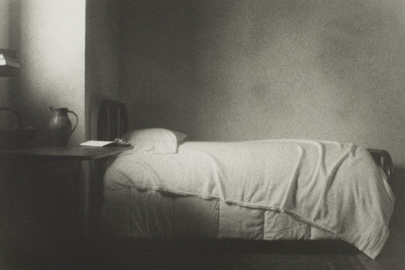 Simple bedroom with unmade bed