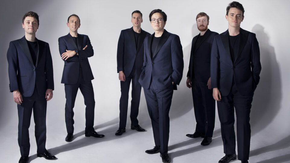 Group of men in dark suits.