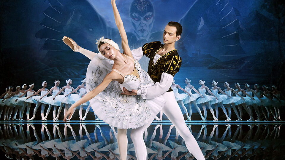 Ballet performance with dancers on stage.